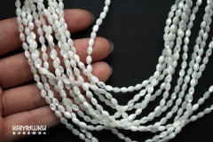 Перламутр белый, "рис", 3х5 мм, набор 9,5 см Перламутр белый, "рис", 3х5 мм, набор 9,5 см