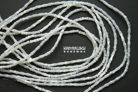 Перламутр белый, "косточка" 4х8 мм, набор 11 бусин Перламутр белый, "косточка" 4х8 мм, набор 11 бусин