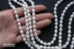 Жемчуг белый "нежный", рис 6х8 мм, набор 11 бусин