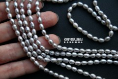 Жемчуг серый, рис 4х6 мм, набор 14 бусин